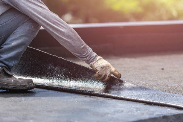 Professional Basement Waterproofing technician working in Dallas, OR
